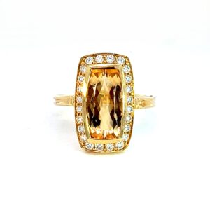 An Imperial Topaz and Diamond Dress Ring
